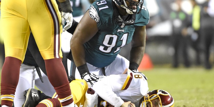 Dec 26, 2015; Philadelphia, PA, USA; Philadelphia Eagles defensive end Fletcher Cox (91) sacks Washington Redskins quarterback Kirk Cousins (8) during the second quarter at Lincoln Financial Field. Mandatory Credit: Eric Hartline-USA TODAY Sports