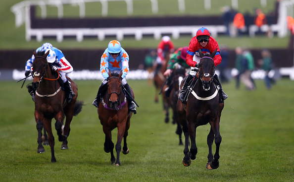 CHELTENHAM, ENGLAND - MARCH 16:  Sprinter Sacre ridden by Nico de Boinville (r) on way to winning the Betway Queen Mother Champion Chase during Ladies Day of the Cheltenham Festival at Cheltenham Racecourse on March 16, 2016 in Cheltenham, England.  (Photo by Michael Steele/Getty Images)